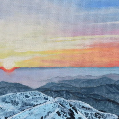 Painting of a mountain landscape with a colorful sunset.